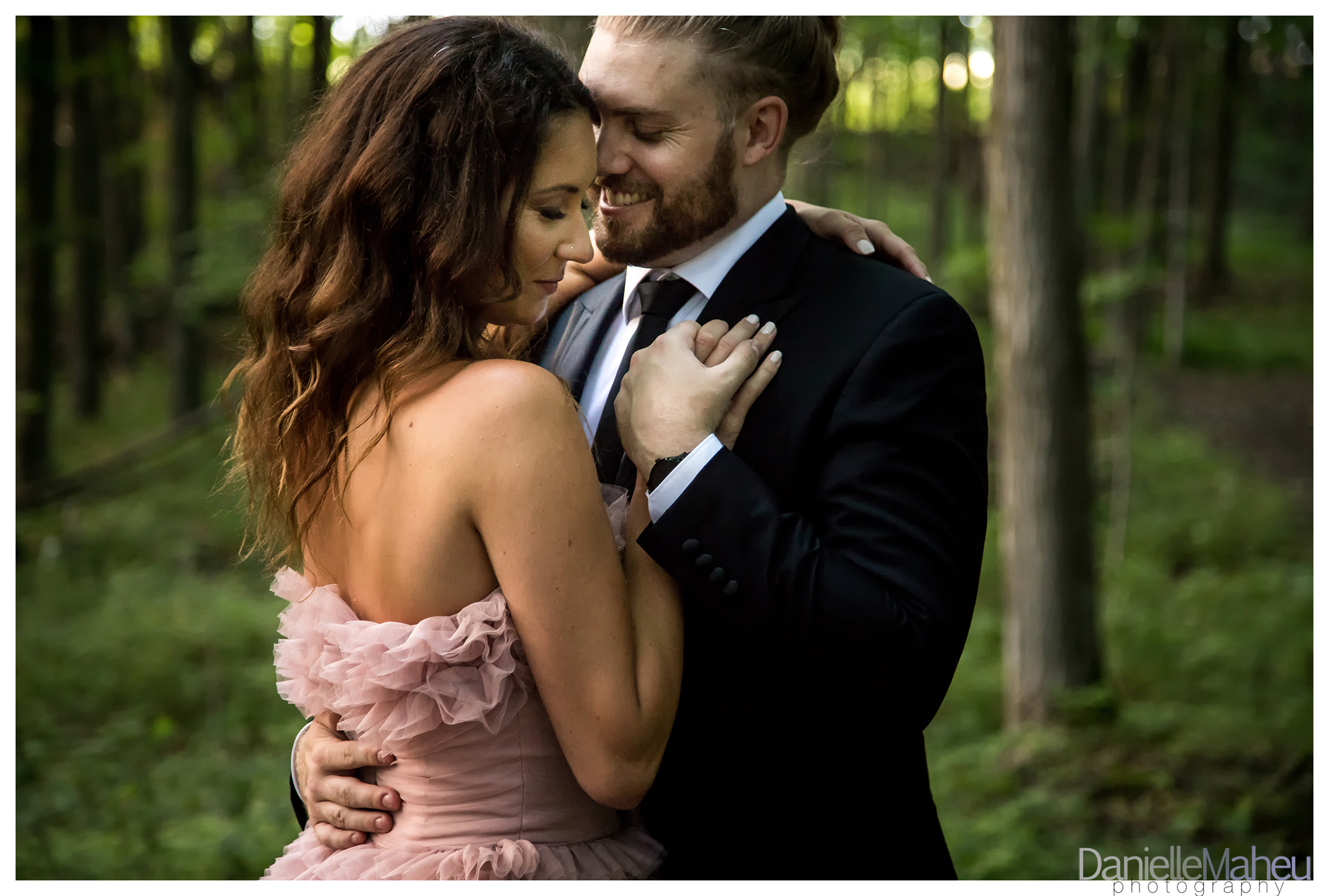 Engaged couple in a pink designer gown at Ivy Ridge wedding venue in Thornton Ontario