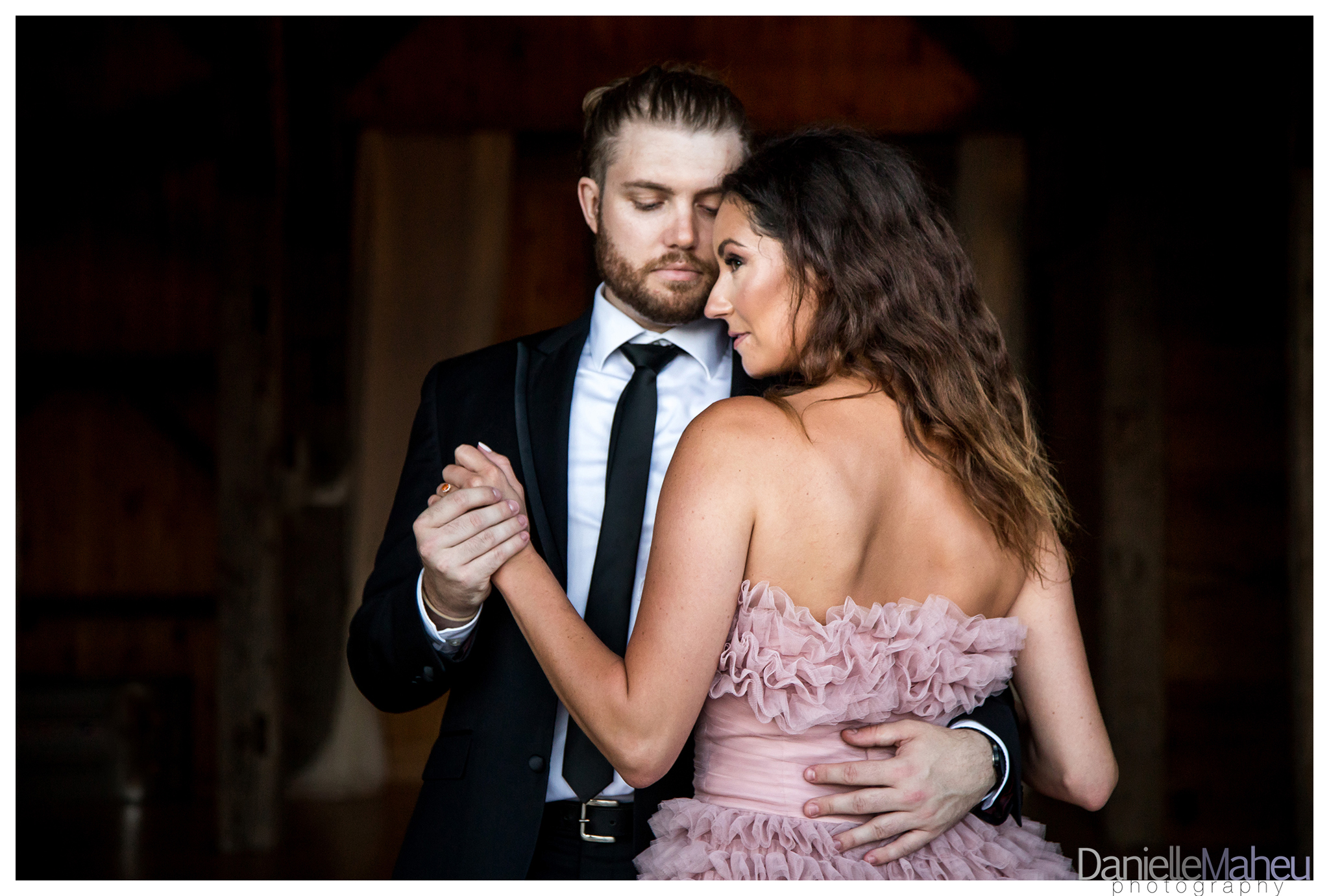 Engaged couple in a pink designer gown at Ivy Ridge wedding venue in Thornton Ontario